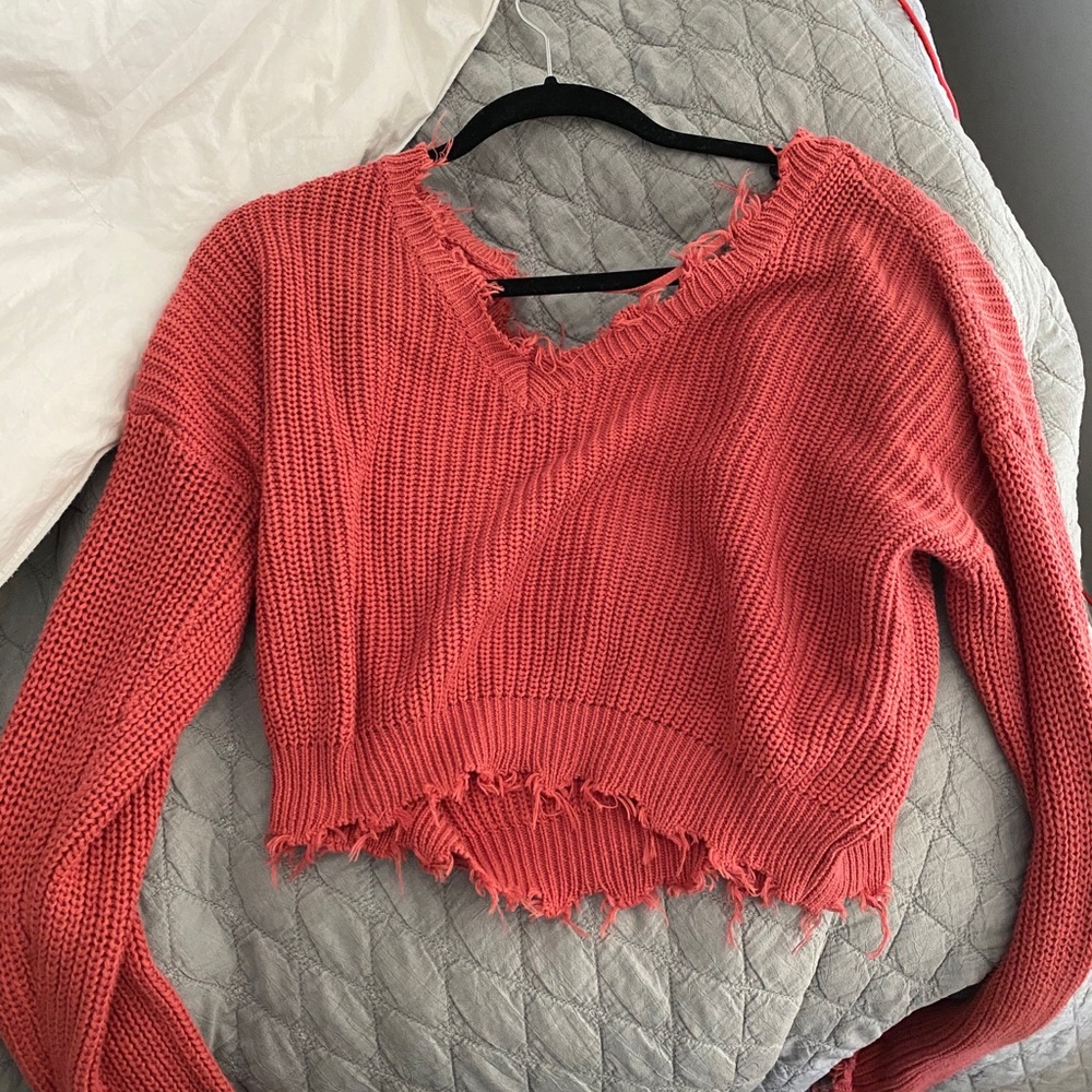 Frayed sweater